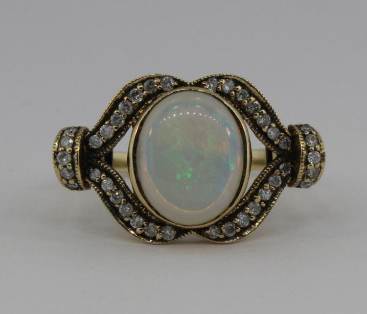 Solid Opal and Diamond 9ct ... image