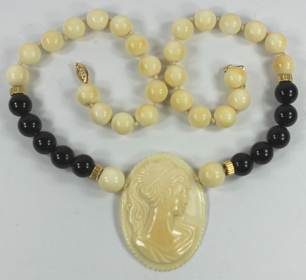 Carved Ivory Medallion strung on a French Jet & Ivory Necklace