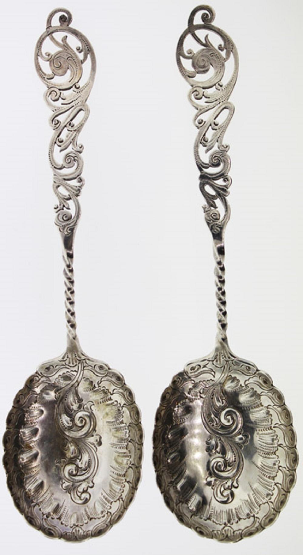 Pair of ornate Antique Silver (0.925) Serving Spoons