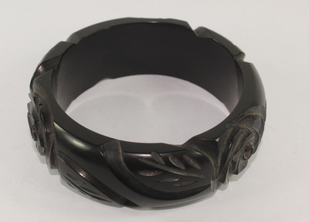 Acrylic Bangle with Incuse Floral Design