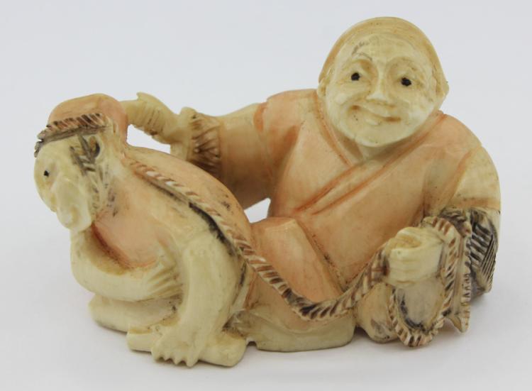 Japanese Netsuke of a Man w... image
